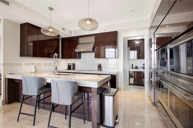 Building Photo - 9705 Collins Ave