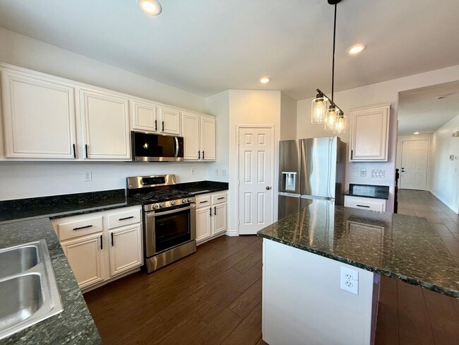 Building Photo - COMING SOON 5/BD 3/BA Home W/ Expansive Yard, Solar Panels, and No Rear Neighbors!