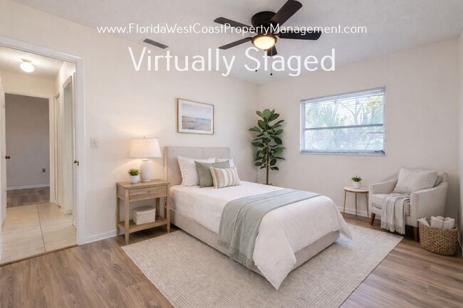 Building Photo - SPACIOUS SARASOTA HOME WITH LARGE FENCED YARD! MOVE IN READY! ALL TILE/ NEW LVP!