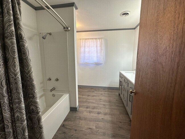 Building Photo - **COMING SOON ON JULY 1ST, 2026** Introducing a charming 3-bedroom, 2.5-bathroom home located in ...