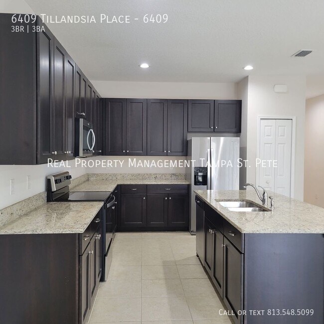 Building Photo - 6409 Tillandsia Pl