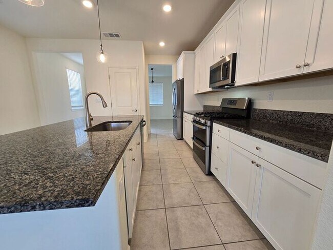 Building Photo - Beautiful Kiley Ranch Home with Open Floor Plan & Private Backyard