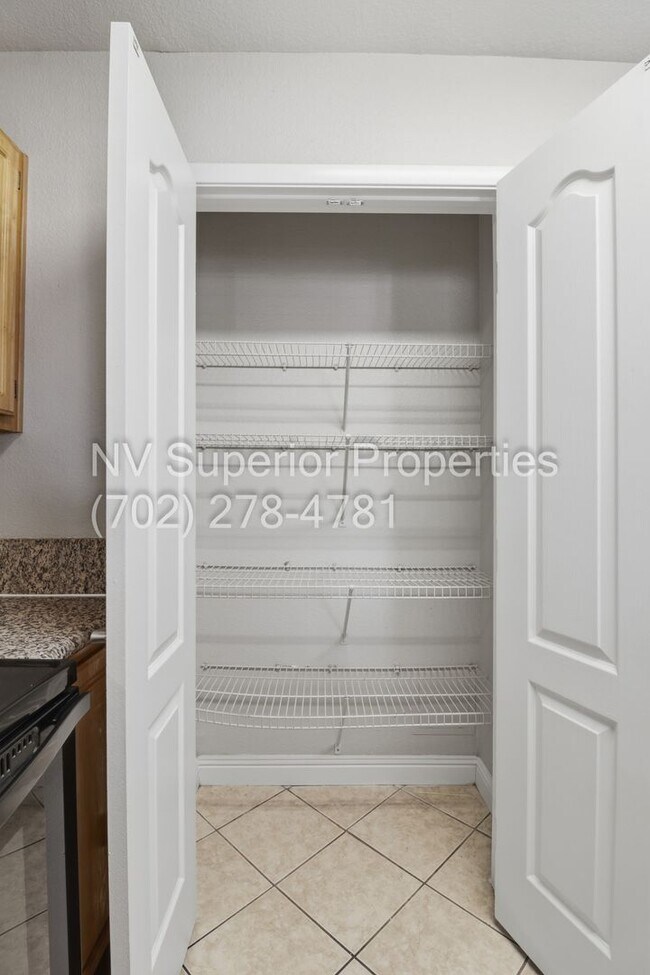 Building Photo - SW!! First floor unit with Balcony!! Gated!! Clubhouse!!  Community pool!! Spa!! Exercise Room!! ...