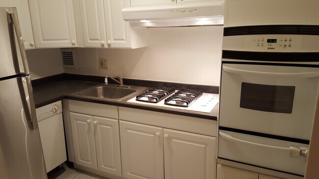 Kitchen with Steel Appliances - 2401 H St NW