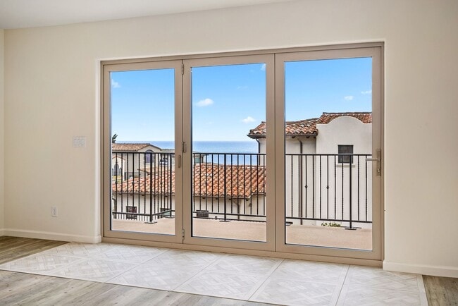 Building Photo - This Sunset Beach Estates Townhome will ha...