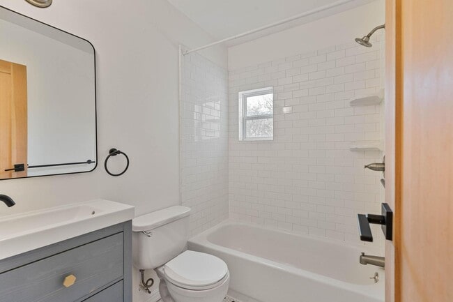 Building Photo - Beautiful, modern 4-bdrm/2-bath home in Concordia—Private, urban sanctuary w/ flex spaces