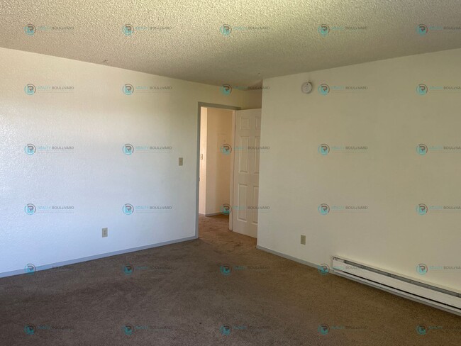 Building Photo - This delightful 2-bedroom, 1-bathroom condo perched upstairs offers an irresistible opportunity y...