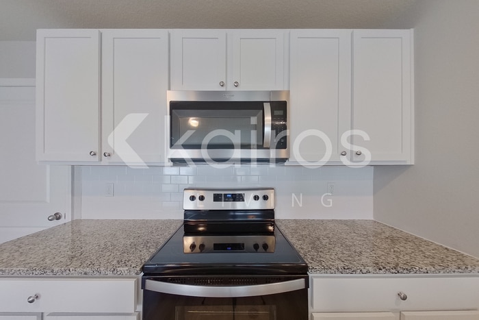 Building Photo - 8597 SW 44th Ct