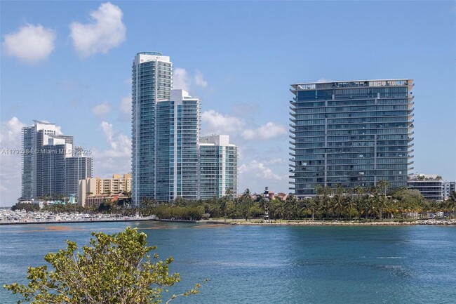 Building Photo - 7154 Fisher Island Dr