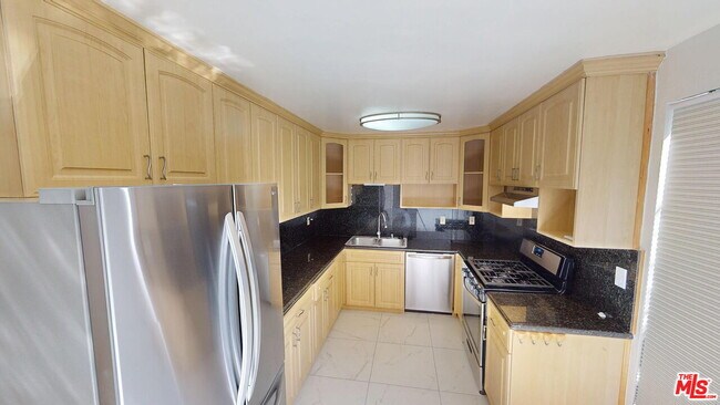 Building Photo - 5115 Kester Ave