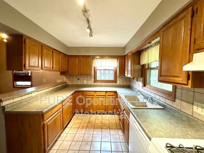 Building Photo - 1009 N 49th Ave