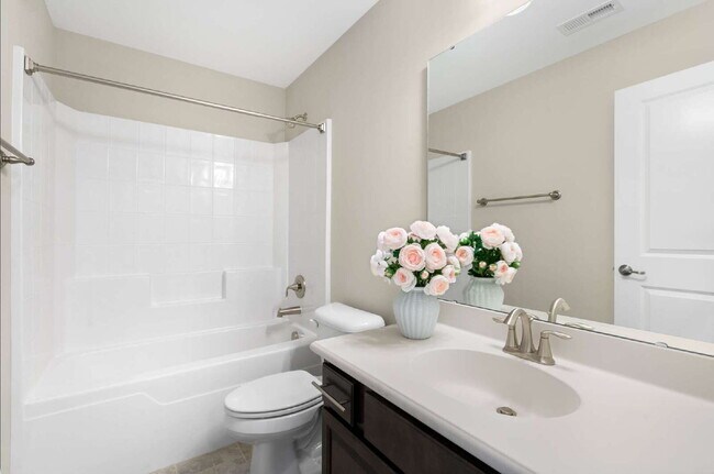 Building Photo - Luxurious 4-Bedroom Retreat with Third Floor Bonus Room & Fenced-in Backyard