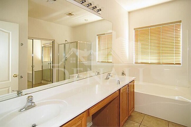 Building Photo - 9237 W Milkweed Loop