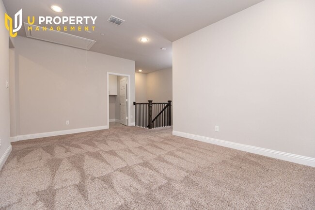 Building Photo - Luxury Townhome- wood flooring. Great location