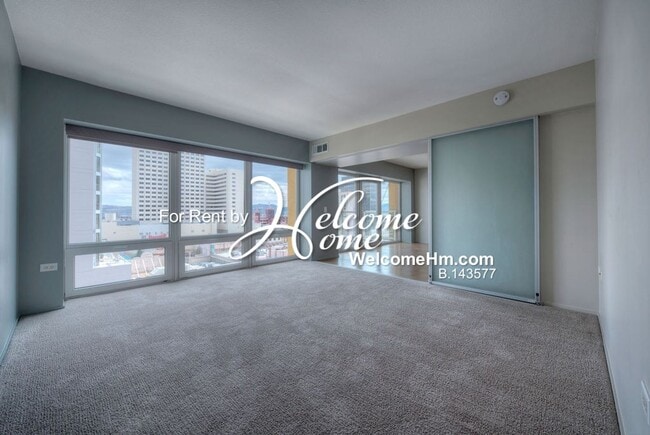 Building Photo - Coming Soon - Downtown High-rise Montage A...