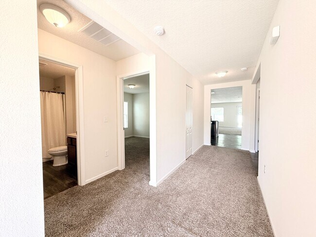 Building Photo - Spacious 4BR Home with Large Fenced Yard & Community Pool