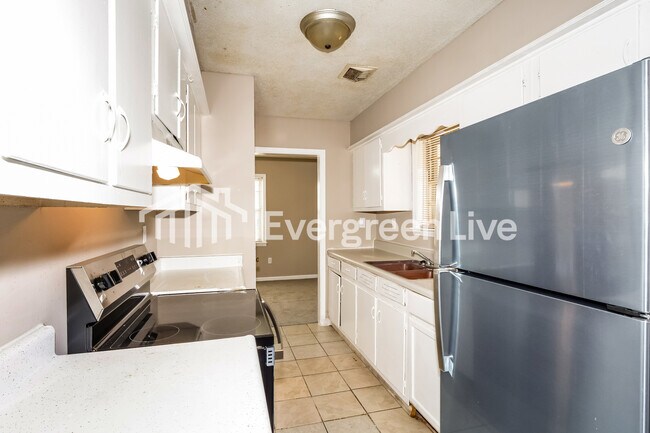 Building Photo - 4996 Harrington Ave