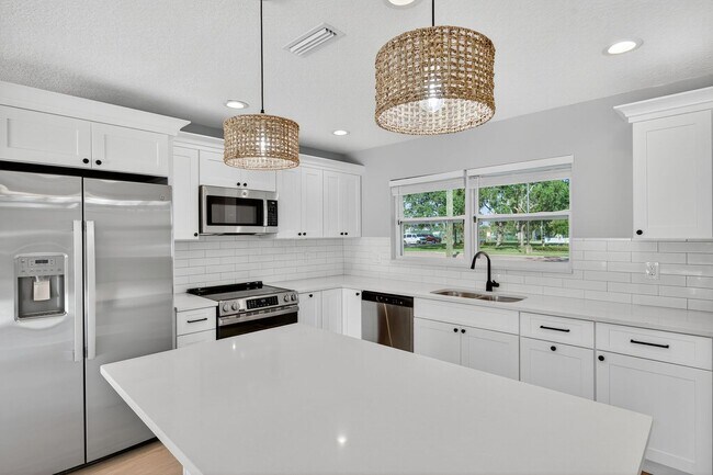 Building Photo - Fully Remodeled 3BR Home with Large Fenced Yard & New Deck