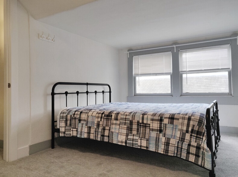 Bedroom with comfortable queen-sized bed - 138 Cypress Ave. E