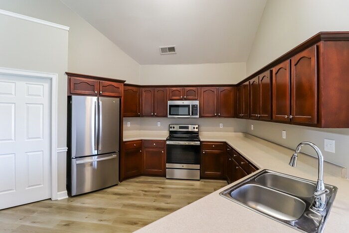 Building Photo - 5036 Devan Woods Cove