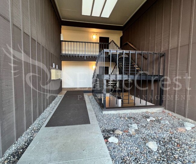 Building Photo - Lovely Two-Bedroom Condominium Located in ...