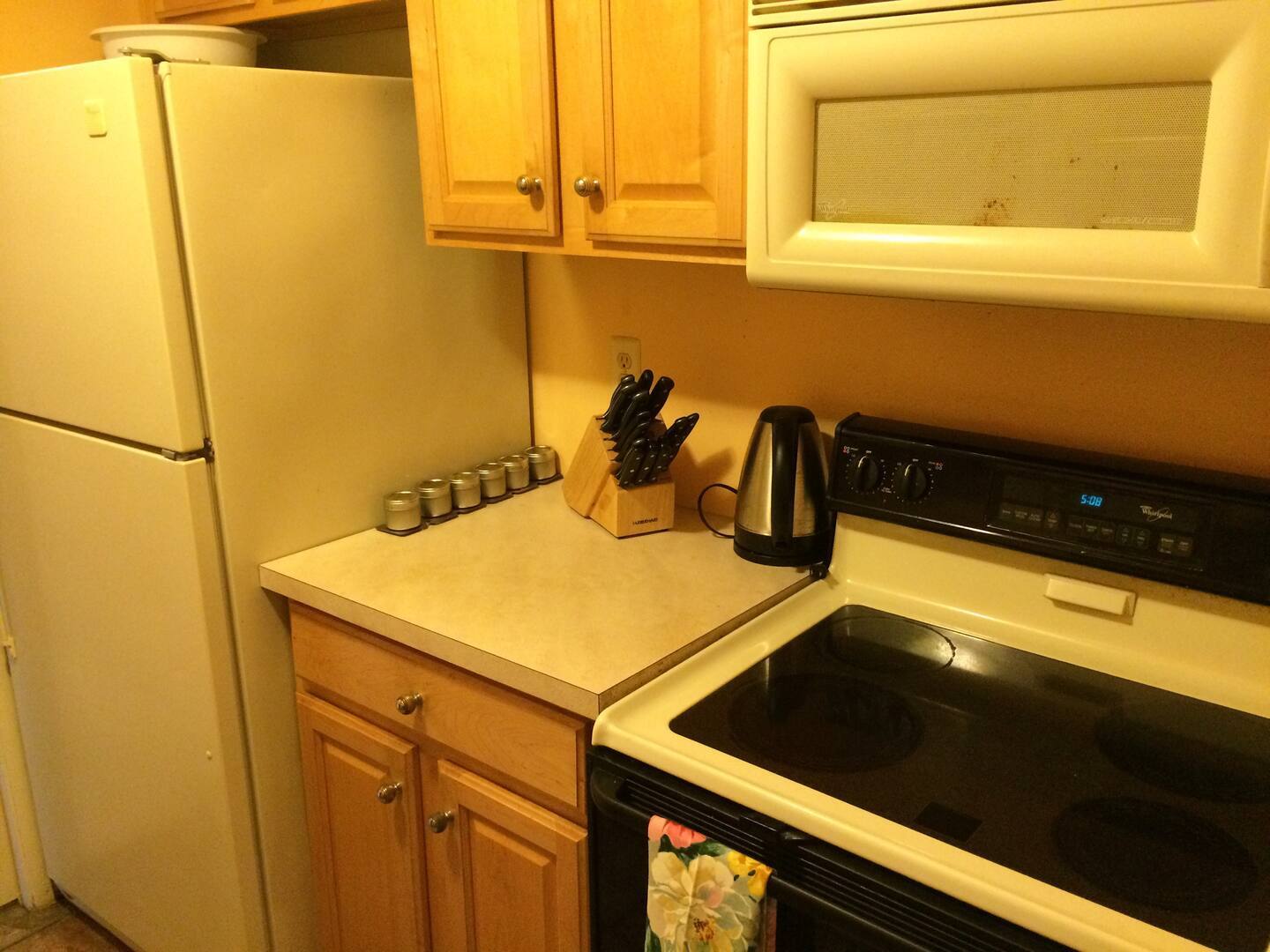 Kitchen comes with oven, microwave, stove, full size fridge, coffee maker and dishwasher etc. - 8200 E Jefferson Ave