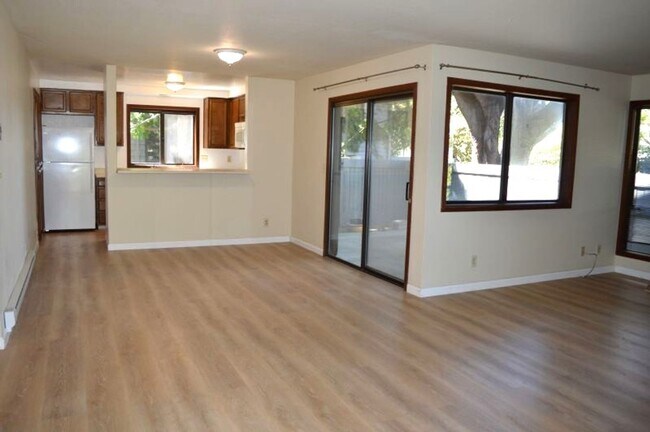 Building Photo - Spacious and Conveniently Located with Private Patio and Parking