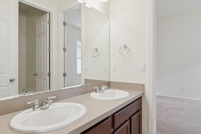 Building Photo - Modern 4-Bed Ranch in Erie with 13-Ft Ceilings, Solar Panels & EV Charger