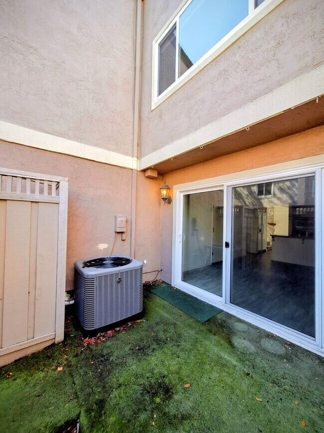 Building Photo - Spacious Two-Story 3bd Townhouse With Private Patios, Balcony, & Garage
