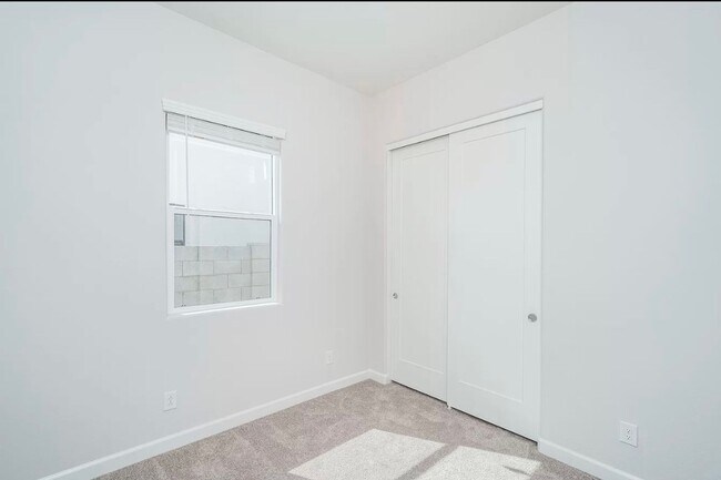 Building Photo - Stunning 4 Bedroom/3 Bath Single Level Home In Estrella Mountain Ranch Community! Newly Built Home!