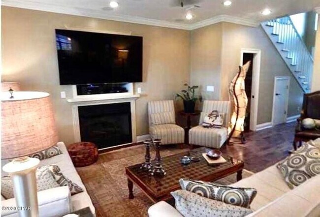 Building Photo - WATERFRONT W/BOAT SLIP!!!! This beautiful home is located in a gated community on North Lagoon Dr...