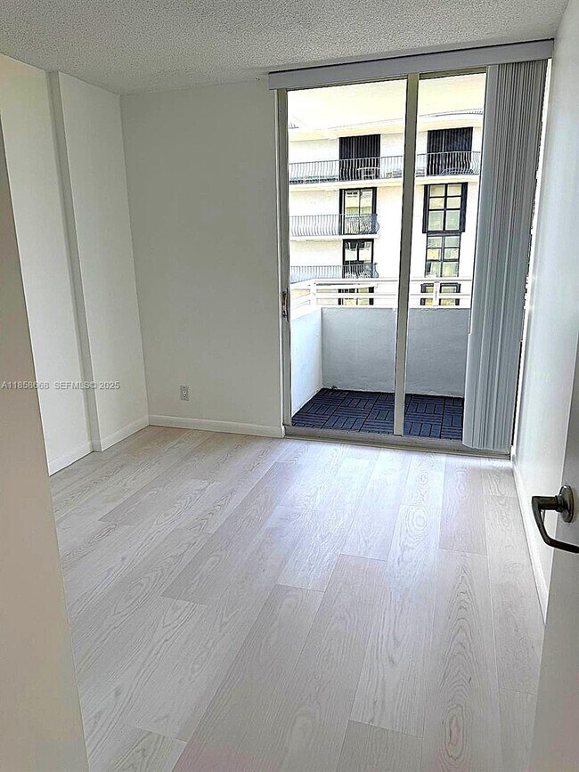 Building Photo - 8911 Collins Ave