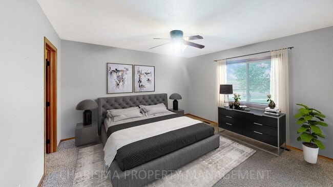 Building Photo - 3 BD, 2.5 BA TOWNHOME, DOUBLE ATTACHED GARAGE, PET FRIENDLY, WALK OUT DECK, LOTS OF SPACE!