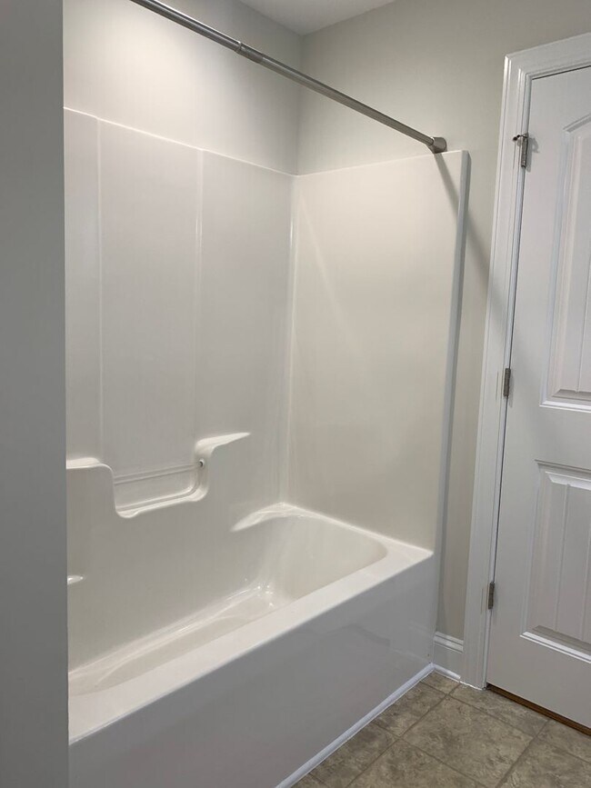 Building Photo - PRIME LOCATION, 3 Bedrooms Suites Apex TH Near HWY, Schools, Shops and Community Amenities!