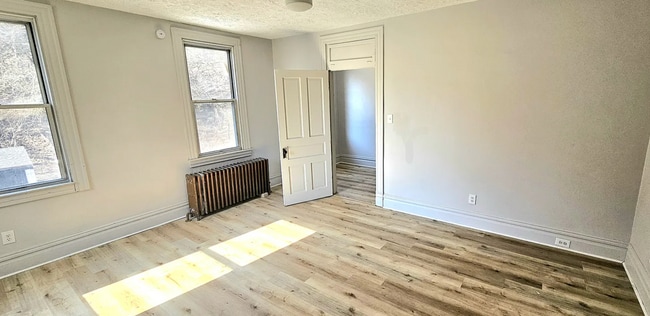 Building Photo - Spacious 4-Bedroom Home with 3-Car Garage, Deck & More!!