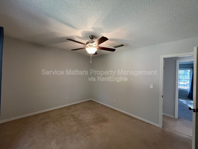 Building Photo - 6004 Players Pl