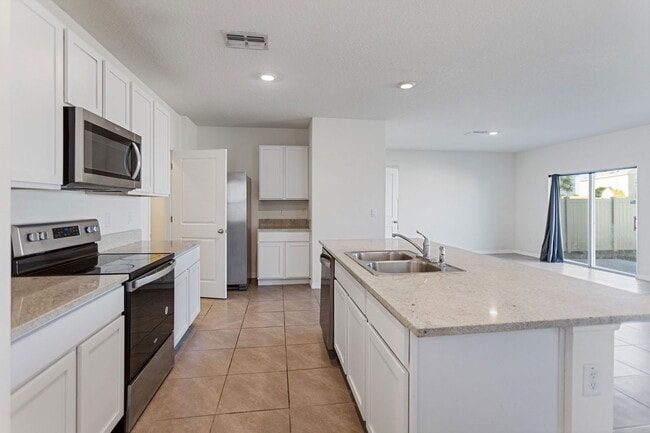 Building Photo - 5557 Birch River Trl