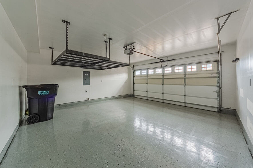 epoxy floors with overhead storage. - 11661 Black Maple Ln