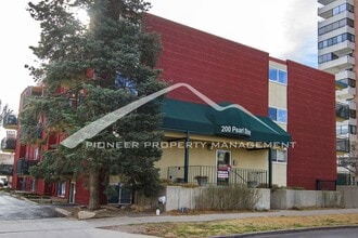 Building Photo - Cozy Condo with Assigned Parking Spot and Balcony