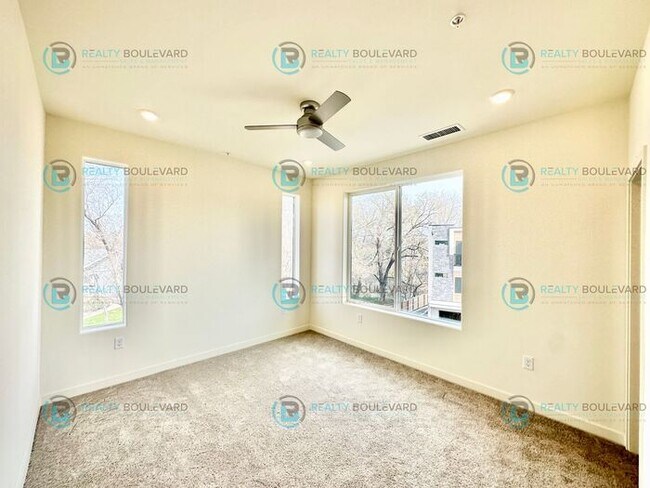 Building Photo - Modern 2 Bedroom 2Bath Townhome with Dual Patios & Designer Finishes near Truckee River