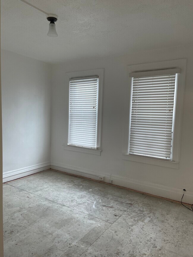 Back smaller bedroom: Wall-to-wall carpeting will be installed after all renovations are complete. - 5350 Kincaid St