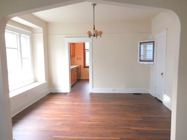 Dining room with built-in window seat w/ storage - 4626 N Mullen St