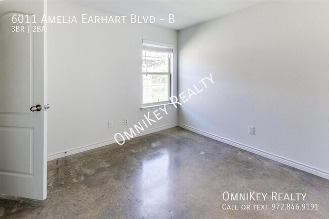 Building Photo - 6011 Amelia Earhart Blvd