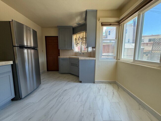 Building Photo - MOVE IN NOW! Cozy Two Bedroom! Shared Outdoor Space!