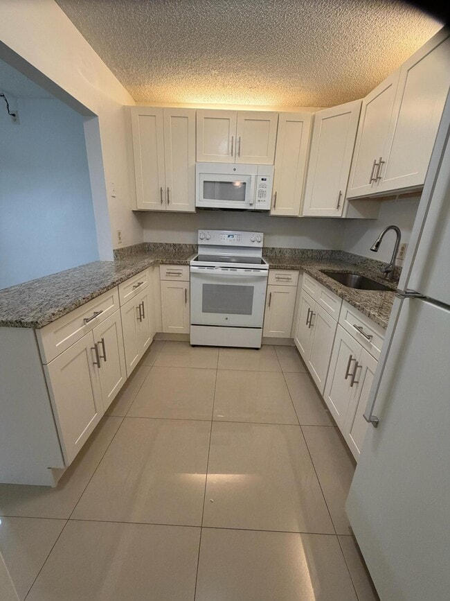 Building Photo - 5930 Whispering Pine Way