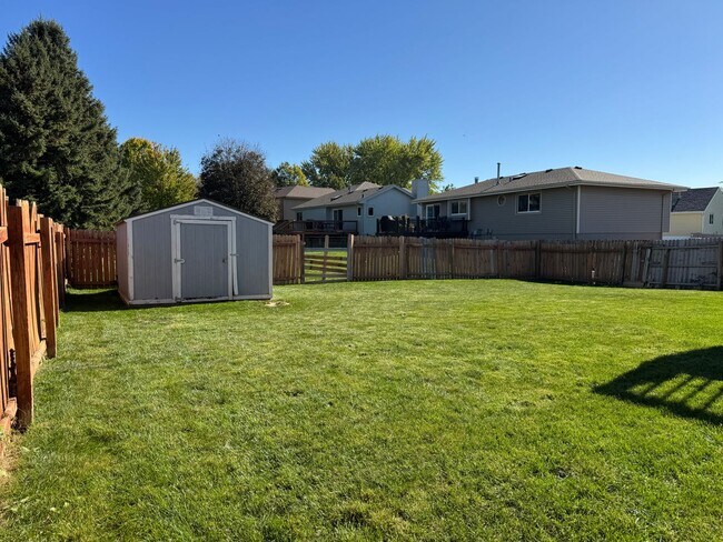 Building Photo - Bright and spacious split-entry home with a finished lower level, large yard, and plenty of updates!