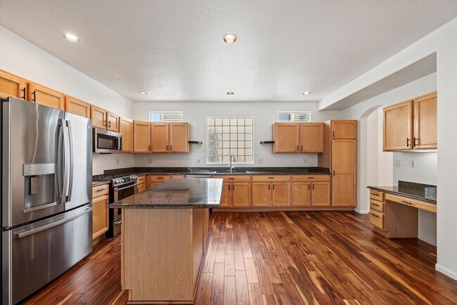 Building Photo - Stunning Tennyson Park Home | 4 Bedrooms, Finished Basement & Open Space Views
