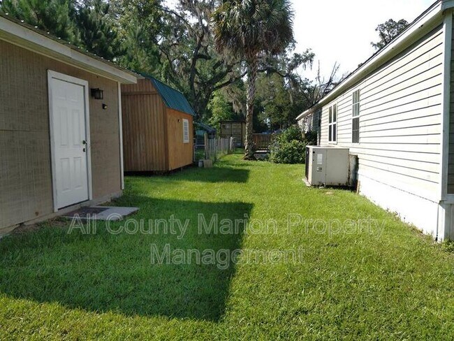 Building Photo - 6455 NW 135th Ave