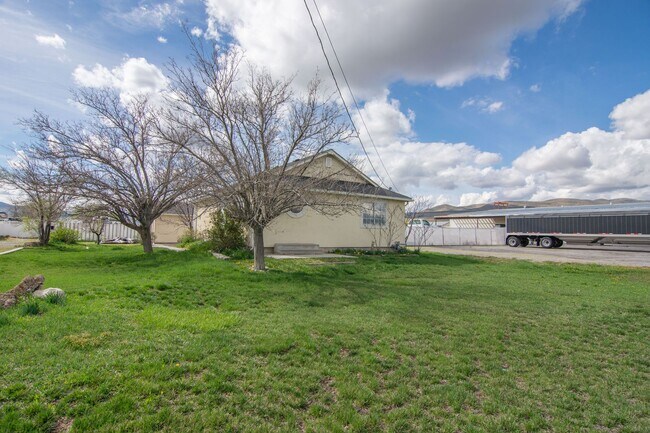 Building Photo - Fully Renovated Home + Shop + RV Parking in Tremonton!