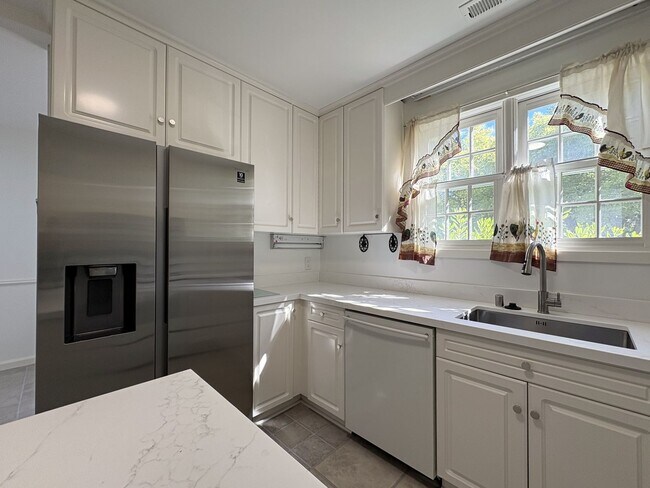 Building Photo - Charming Updated 4BR Home on Prime Corner ...